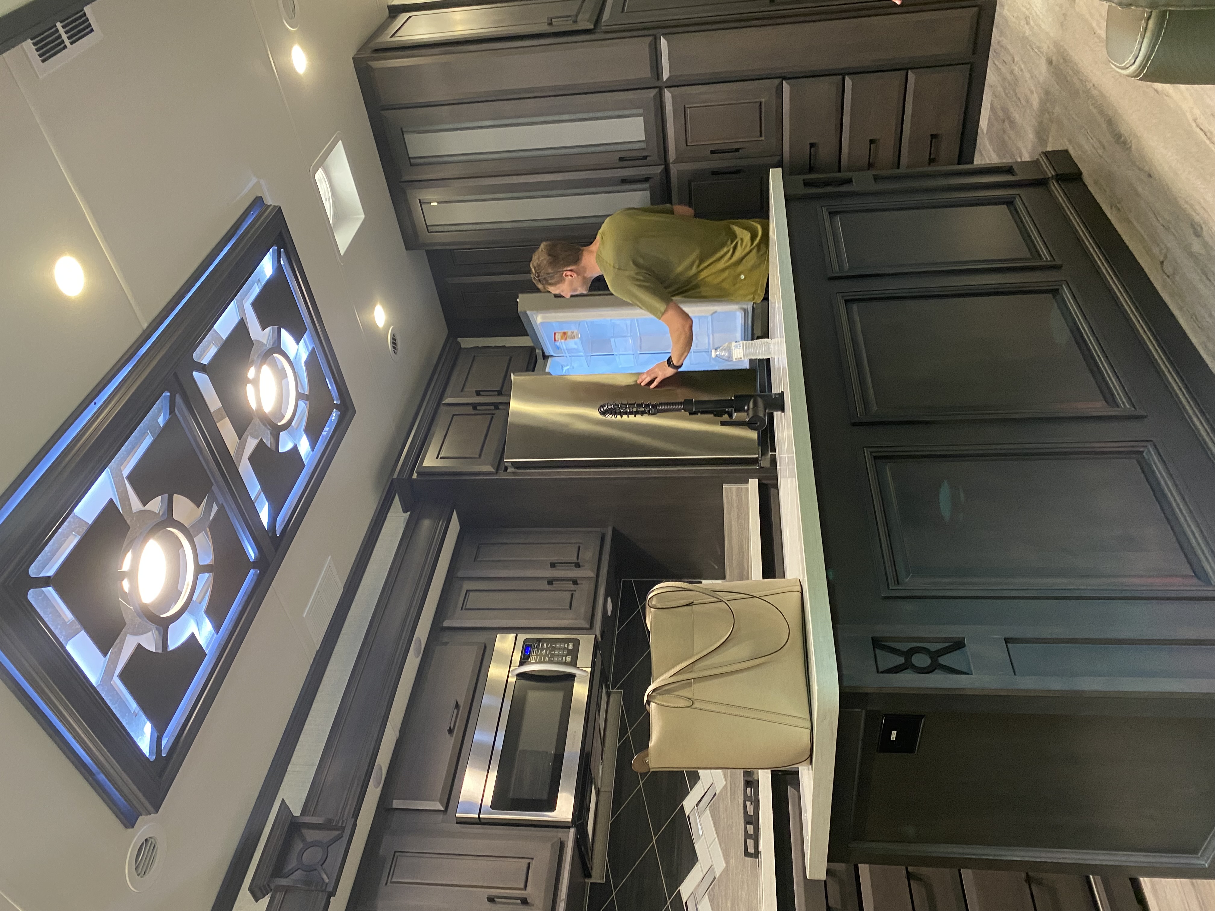 Dark custom kitchen cabinetry